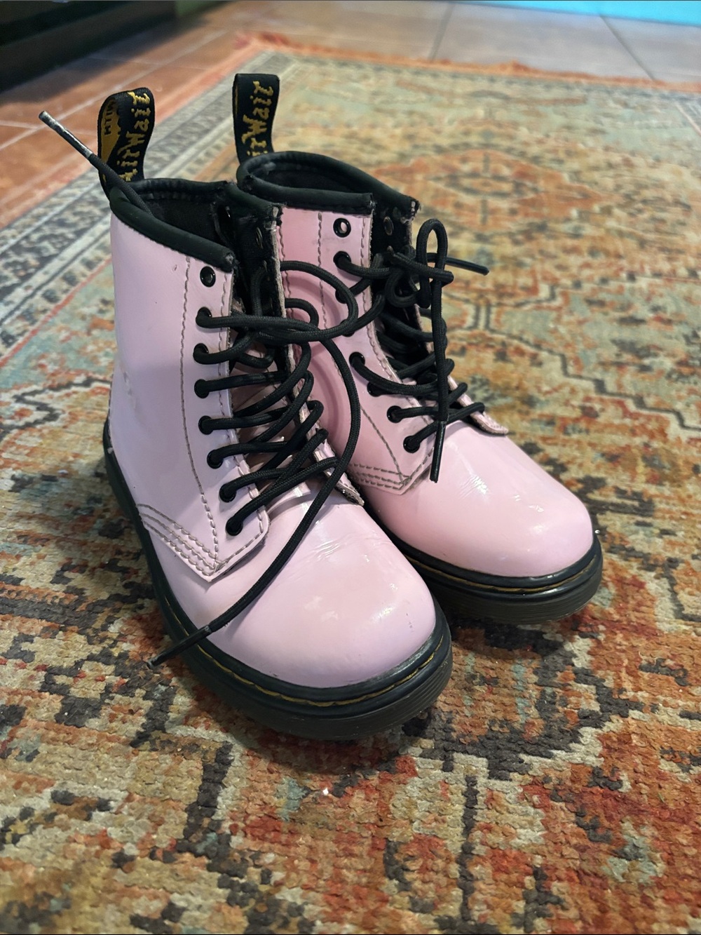 Dr. Martens Pink Patent Kids Lace-Up Boots with Black Soles